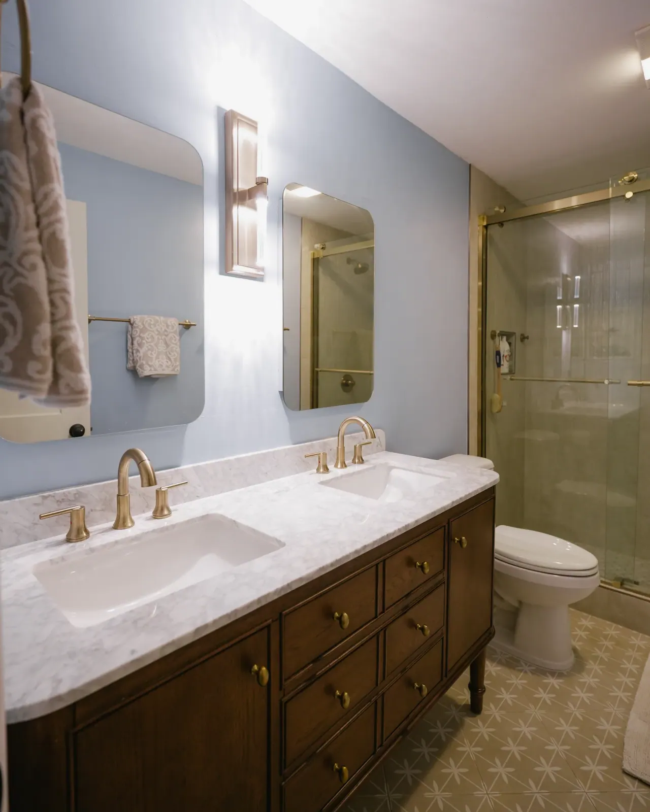 Traditional walnut vanity with a marble top