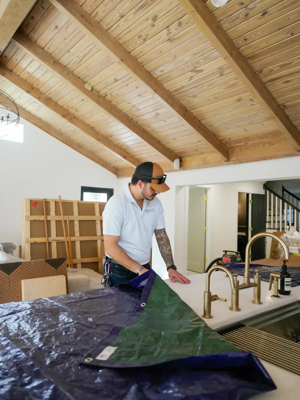 Kitchen install under a wood ceiling