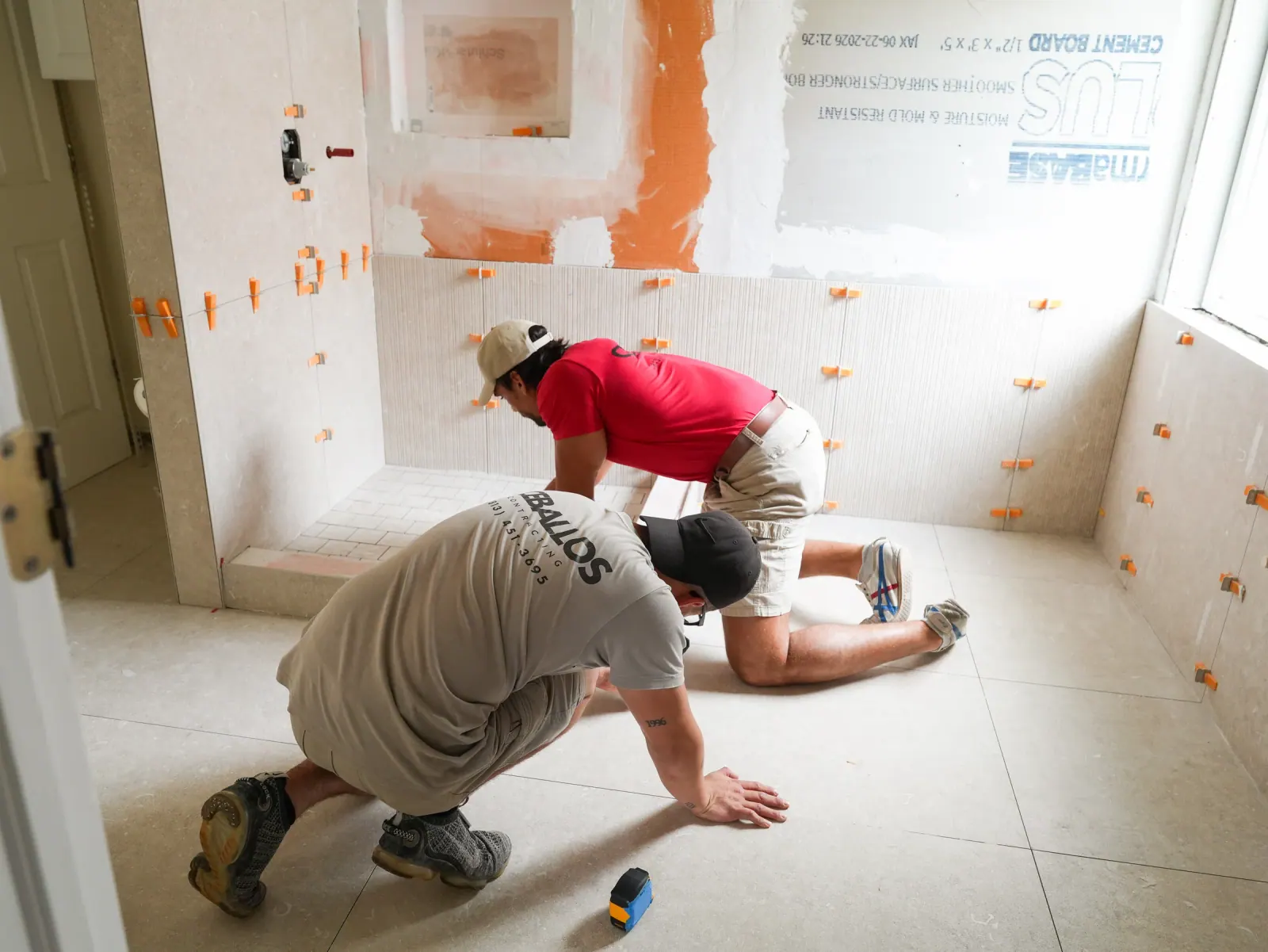 Laying out tile on the floor
