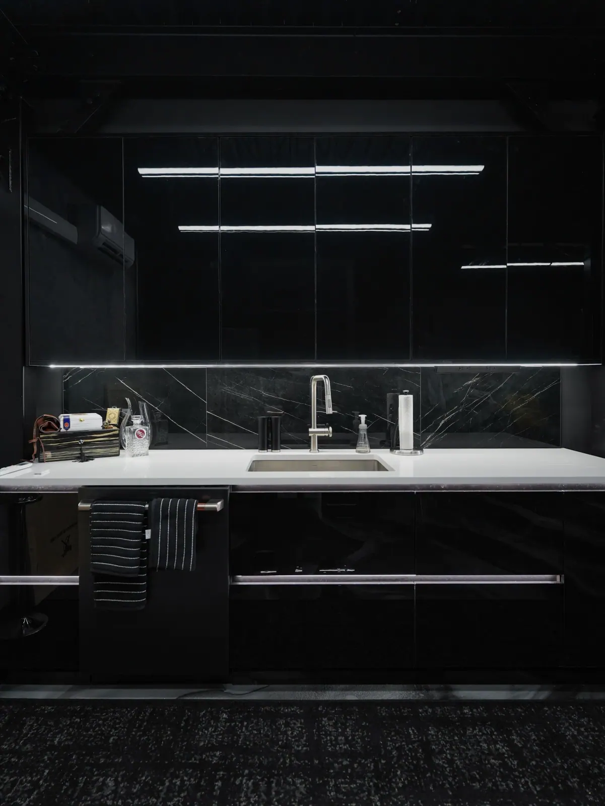 Black lacquer bar with marble counters